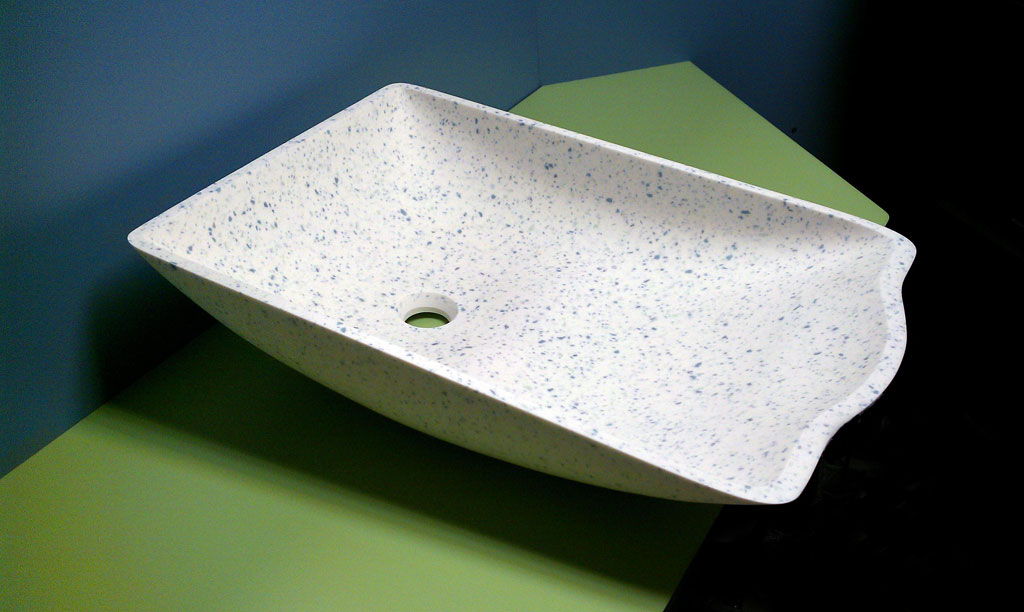 ASST Cradle™ Baby Bowl, with seamless solid surface design for hospital labor and delivery rooms. Available in Corian, LG HI-MACS, and other solid surface brands.