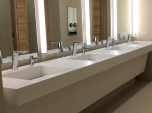 Everything Including the Bathroom Sink: Solid Surface Elegance and ADA Compliance Are Unlikely Friends